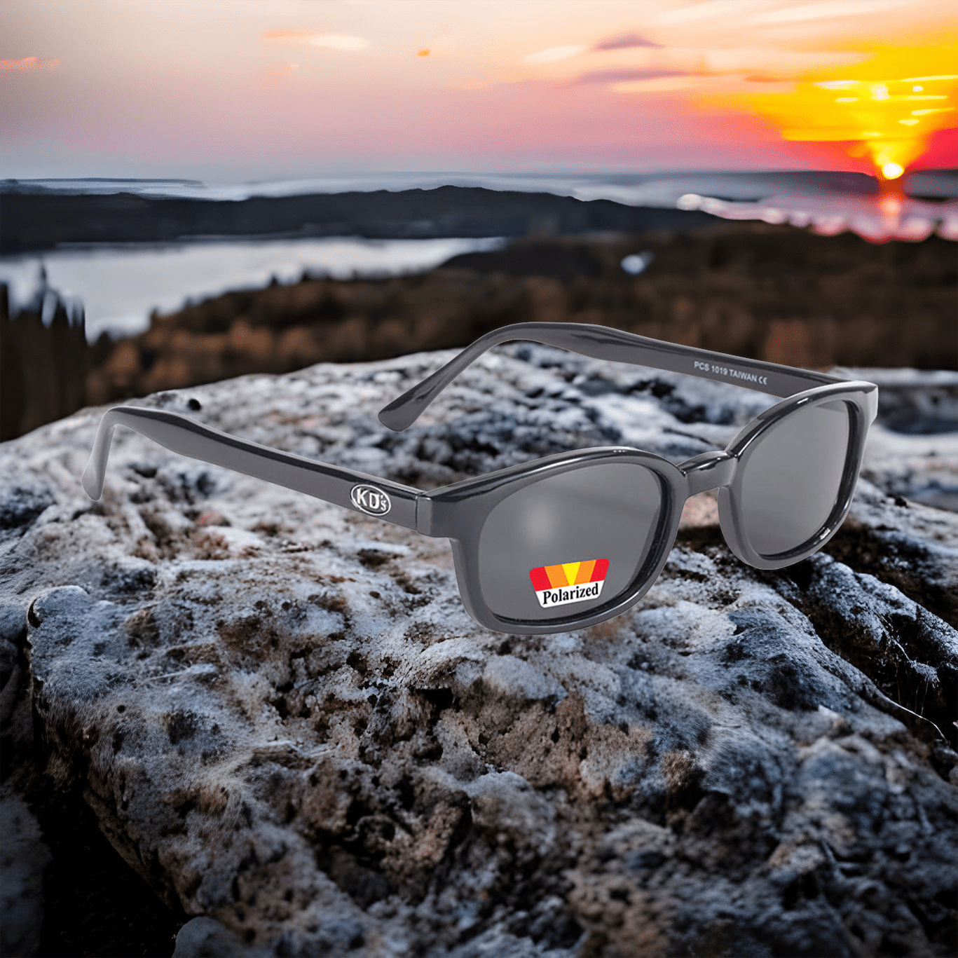 Gafas de sol X-KD's 1019 montura negra y cristales polarizados grises